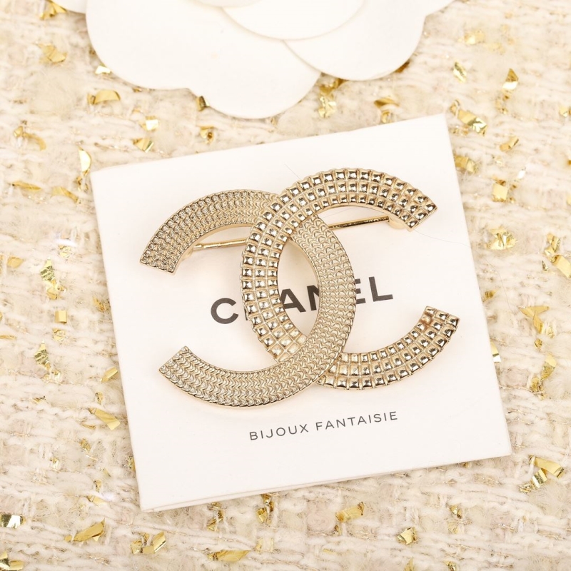 Ch**el brooches